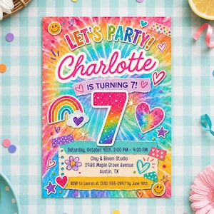 May include: A rectangular birthday invitation card with a colorful tie-dye background. The text reads: LET'S PARTY! Charlotte IS TURNING 7! Saturday, October 10th, 2:00 PM - 4:30 PM, Clay & Bloom Studio, 2486 Maple Grove Avenue, Austin, TX, RSVP to Lauren at (512) 555-2847 by June 10th. Features include a large glittery number 7, a rainbow, hearts, and smiley faces.
