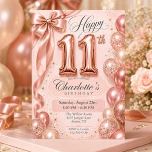 Peut inclure: Une carte d'invitation d'anniversaire rose avec un grand ballon en aluminium or rose en forme de chiffre 11, un nœud en satin et des ballons or rose. Le texte indique Happy 11th Birthday, Charlotte's, Saturday, August 22nd, 4:30 PM - 6:30 PM, The Willow Room, 4287 Juniper Lane, Austin, TX, et RSVP to Lauren 512-555-0186.