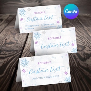 Puede incluir: Tres tarjetas blancas plegadas con diseños de copos de nieve y las palabras "Custom Text" en una fuente de escritura. Las tarjetas tienen casillas de verificación para preferencias dietéticas. El logotipo de Canva está en la esquina superior derecha.