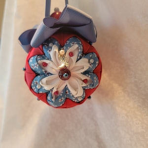 Red, white, blue floral ornament (RMB32)