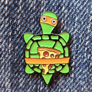 Pizza Turtle Enamel Pin (surprise sticker included)