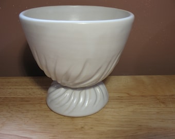 Hand thrown two-piece carved ceramic piece