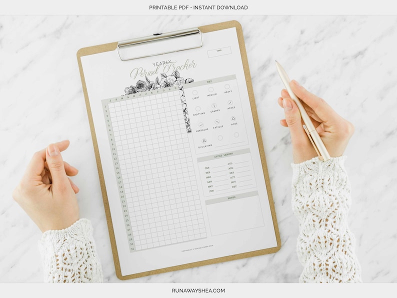 May include: A printable yearly period tracker with a floral design. The tracker includes a grid for tracking your cycle, a section for noting symptoms, and a section for recording cycle length.