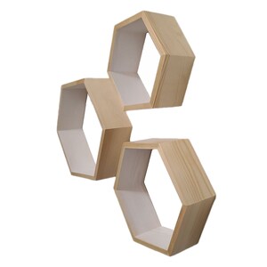 May include: Three wooden hexagonal shelves in a natural wood finish. The shelves are stacked on top of each other and are angled to create a unique and modern look.