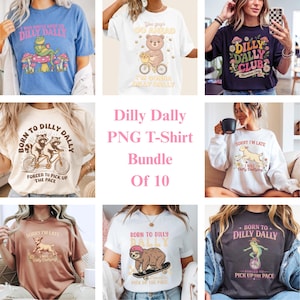 Puede incluir: Un conjunto de diez camisetas con varios diseños gráficos. Las camisetas presentan frases como "Dilly Dally Club" y "Born to Dilly Dally", junto con ilustraciones de animales como una rana, un oso y un perezoso. Las camisetas son de varios colores.