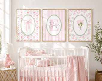 May include: Three framed wall art prints featuring pink and white patterns. The left print shows a pink bow, the center print displays the name Eloise with a large letter E, and the right print features a bouquet of pink tulips, all in oval frames.