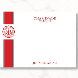 May include: A white card with red and gray bands on the left side. The card has the text "Chaminade - St. Louis" and "John Helmsing" printed in red. The left band features a red seal with the text "Chaminade College Preparatory School" and a crest.