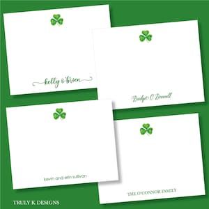 May include: Four white notecards with a green shamrock design at the top. Each card features a different name in green script: Kelly O'Brien, Bridget O'Donnell, Kevin and Erin Sullivan, and The O'Connor Family. The cards are on a green background.
