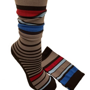 May include: Striped knee-high socks in brown, gray, red, blue, and black.