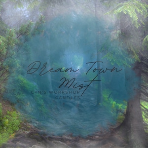 May include: A misty forest scene with a path leading through the trees. The text "Dream Town Mist" is superimposed on the image, along with the words "Cyn's Workshop Candles".