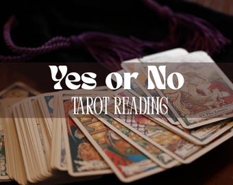 May include: A close-up of a deck of tarot cards with the text "Yes or No Tarot Reading" on top. The cards are spread out on a table, with the top card showing the Lovers card.