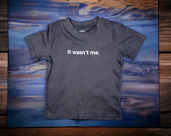 Playful and Comfortable: 2T Black Cotton T-Shirt with 'It Wasn't Me' Lettering