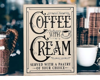 Add Charm to Your Coffee Corner with this Ivory and Black Wood Canvas Sign - 'Coffee With Cream Served With A Pastry Of Your Choice'