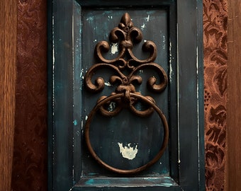 Transform Your Home Decor with Our Repurposed Cabinet Door Featuring a Cast Iron Hand Towel Ring!