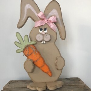12 in. Cute Easter Bunny Holding Carrot Table Decoration main image 0