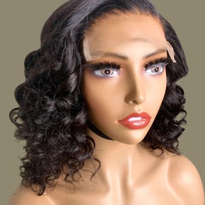Deep Wave Hair Transparent Lace Closure Wig Natural Hairline Appearance Medium Size Unit Pre Plucked Design Tinted Lace Construction Bleached Knots Feature Black Women Extension Protective Styling Option Glueless Application Twelve Inch