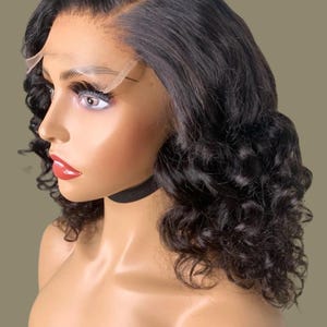 Medium Size Wig Transparent Lace  Five By Five Closure Construction Deep Wave Pattern Virgin Hair Quality Twelve Inches Length Pre Plucked Hairline Natural Looking Appearance Black Women Extension Protective Style Option Bleached Knots