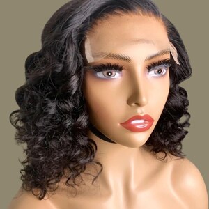 Virgin Hair Wig Transparent Lace Closure Deep Wave Pattern Natural Looking Appearance Medium Size Design Pre Plucked Hairline Feature Bleached Knots Construction Tinted Lace Application Black Women Extension Protective Style Option Ready To