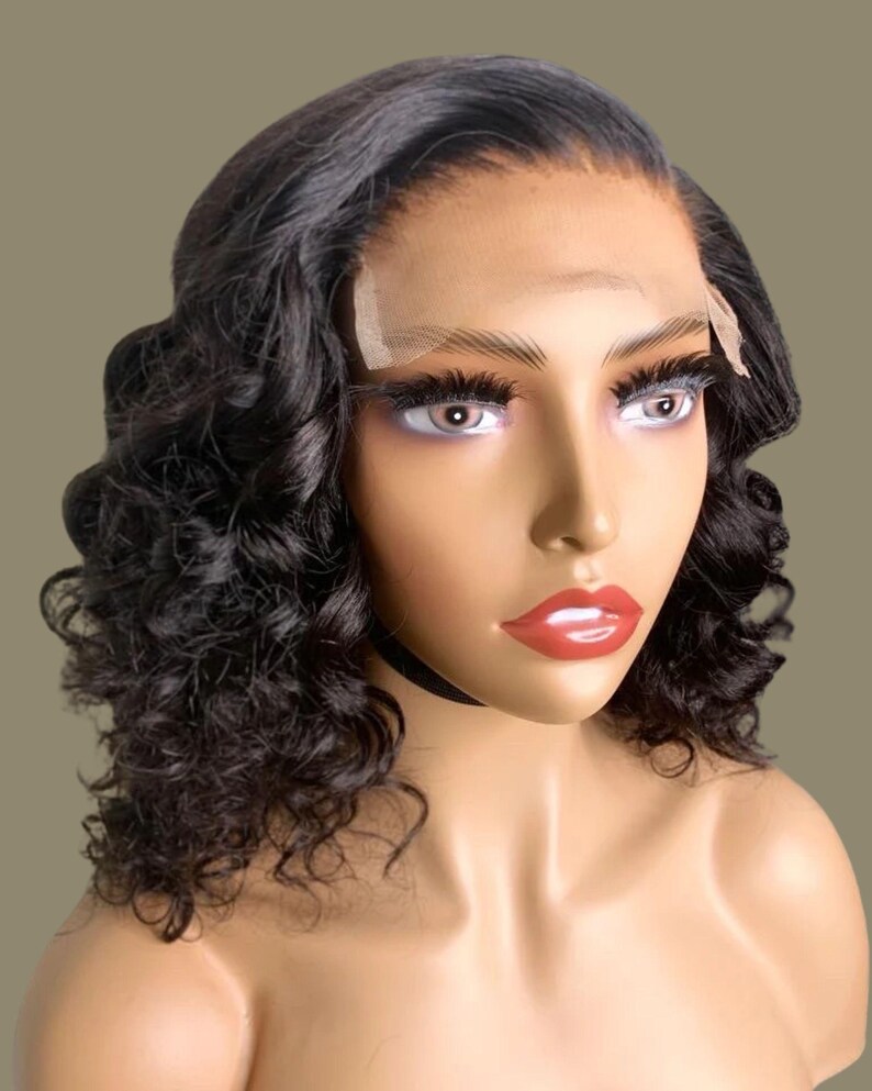 Virgin Hair Wig Transparent Lace Closure Deep Wave Pattern Natural Looking Appearance Medium Size Design Pre Plucked Hairline Feature Bleached Knots Construction Tinted Lace Application Black Women Extension Protective Style Option Ready To