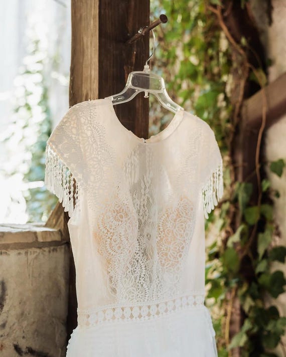 Queen JACKIE | Short Cap Sleeve Wedding Dress with Tassel Trim & Soft Boho Lace - Keyhole Back with Tulle Train | by Queen Bridal Queen JACKIE | Short Cap Sleeve Wedding Dress with Tassel Trim & Soft Boho Lace - Keyhole Back with Tulle Train | by Queen Bridal