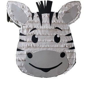 May include: A white and black zebra piñata with a black mane and black eyes. The piñata is made of tissue paper and has a smiling face.