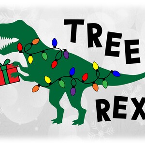 May include: A green dinosaur with Christmas lights wrapped around it, holding a red gift box. The text "TREE REX" is written in black letters above and below the dinosaur.