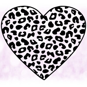 May include: A black and white heart-shaped design with a leopard print pattern.
