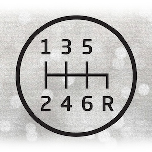 May include: A black and white diagram of a 6-speed manual transmission gear shift pattern. The numbers 1, 2, 3, 4, 5, and 6 are arranged in a circle, with the letter 'R' for reverse at the bottom.