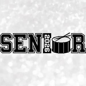 May include: Black and white graphic featuring the word "SENIOR" in a collegiate font, the year "2026", and a drum with drumsticks. The design is set against a sparkling, light background.