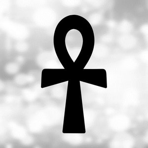 May include: A black ankh symbol against a blurred, light-colored background. The ankh, an ancient Egyptian hieroglyphic symbol, is a cross with a loop at the top. The image is in black and white.