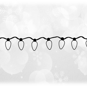 May include: A string of white Christmas lights with black wire, hanging against a white background with a snowflake pattern.