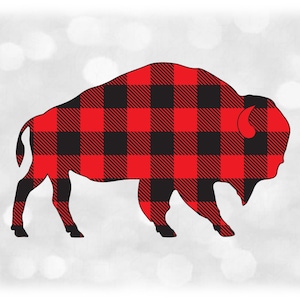 Puede incluir: Una silueta de búfalo roja y negra con un patrón de cuadros.