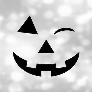 May include: A black and white Halloween-themed graphic featuring a jack-o'-lantern face. The design includes a triangular nose, a winking eye, and a smiling mouth with square teeth. The background is a blurred, light-colored pattern.