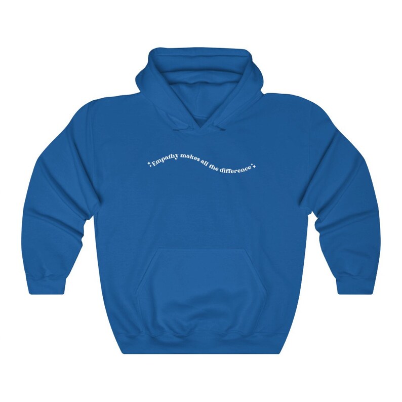 May include: A royal blue hooded sweatshirt with the text "Empathy makes all the difference" in white lettering.