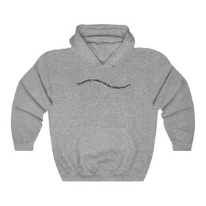 May include: A gray hooded sweatshirt with the text "Empathy makes all the difference" printed on the front.
