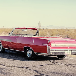 on a desert highway, red convertible classic car, fine art image, wall gallery art image, home decor wall gallery