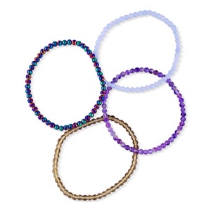 Anti Anxiety Crystal Bracelets 4mm round beads of Amethyst, Blue Lace Agate, Smoky Quartz, Rainbow Hematite on white background. Dainty stackable crystal bracelet design with intention of relieving stress and worry.