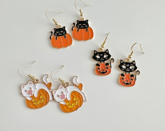 Cat on pumpkin earrings, spooky cat earrings, spooky pumpkin earrings, Halloween earrings, Halloween gifts.