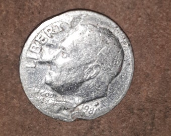 Misprinted 1981 Philadelphia mint dime no other like it in existence