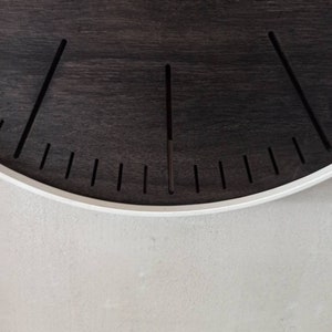 Big round BLACK wood and  WHITE steel wall clock. Simple elegant and minimalistic. Perfect gift