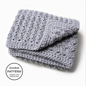 May include: A gray crocheted blanket folded on a white surface. The text "Crochet Pattern Instant PDF Download" is visible in a circle.