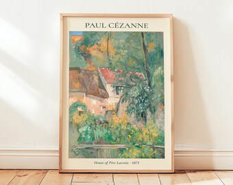 May include: A framed art print featuring a Paul Cézanne painting titled House of Père Lacroix - 1873. The artwork depicts a house with a red roof surrounded by green trees and foliage, set within a light-colored border in a wooden frame.