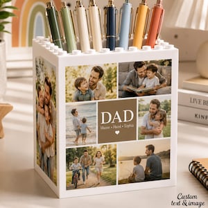 May include: White pen holder with a collage of family photos and the word "DAD". The holder contains several pens in various colors. The text "Custom text & image" is at the bottom right.