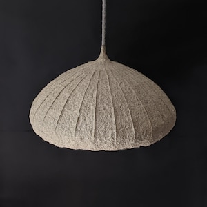 Paper mache pendant lamp with round shade and white inside. Ecological material and glue. Vegan. Model 14