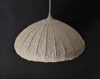 Paper mache pendant lamp with round shade and white inside. Ecological material and glue. Vegan. Model 14