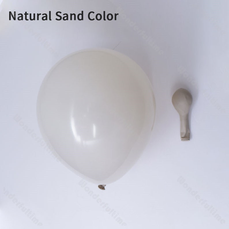 May include: A close-up of a natural sand colored balloon, deflated, next to a smaller, inflated balloon of the same color. The text "Natural Sand Color" is visible at the top of the image.
