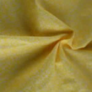 May include: Close-up of a crumpled piece of yellow fabric. The fabric has a slightly textured surface and appears to be thin and lightweight. The colour is a warm, sunny yellow, with subtle variations in tone.