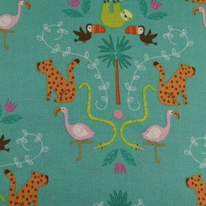 May include: Teal fabric featuring a repeating pattern of jungle animals. The design includes orange leopards, pink flamingos, green sloths, brown toucans, and green snakes. White vines and pink flowers complete the tropical theme.