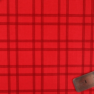 May include: Vibrant red fabric featuring a dark red plaid design. A metal ruler with centimetre markings is in the bottom right corner. The fabric has a woven texture.