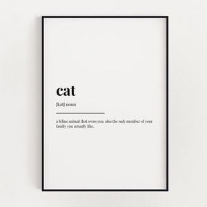 Peut inclure: Une impression murale d'art imprimable en noir et blanc avec la définition du mot "chat" dans un style minimaliste. La définition se lit comme suit : "un animal félin qui vous appartient, également le seul membre de votre famille que vous aimez vraiment."